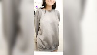 Flashing my shaved tits under this hoodie, ready for a naughty snapshot.